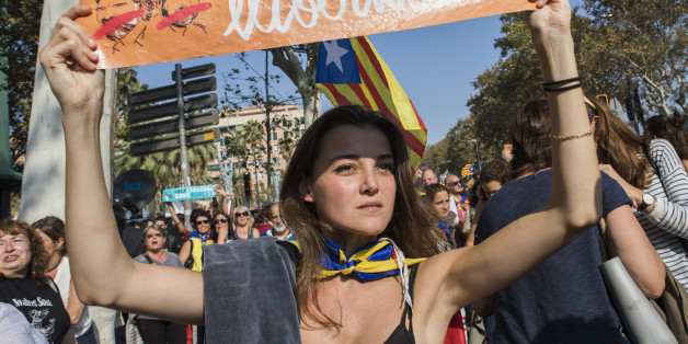 Thousands of Catalan independence supporters have marched in center city and massed outside the Parliament of Catalonia waiting for the votes to declare independence from Spain in Barcelona,
Spain, on 27 October 2017. (Photo by Mauro Ujetto/NurPhoto via Getty Images)