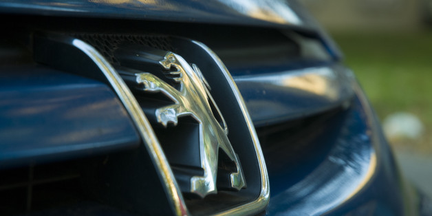 The logo of a Peugeot car is seen on its front grill on September 29, 2017. (Photo by Jaap Arriens/NurPhoto via Getty Images)