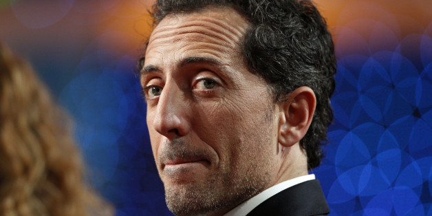 French actor Gad Elmaleh attends the 25th Telethon organised by the French Muscular Dystrophy Association (AFM) in Saint Denis, near Paris December 3, 2011. The annual fundraising event, which is aired live on French television for 30 hours, is held to collect money for research into genetic diseases in children. REUTERS/Gonzalo Fuentes (FRANCE - Tags: ENTERTAINMENT MEDIA SOCIETY HEADSHOT)