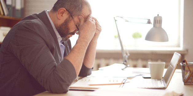 Mature Adult man working in the office