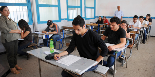 Tunisian students take the baccalaureat (high school graduation exam) exam on June 9, 2011 in Tunis. Yesterday Tunisian Prime Minister Beji Caid Essebsi announced that the first free elections in the post-Ben Ali in Tunisia, originally scheduled for July 24, are postponed to October 23. AFP PHOTO / FETHI BELAID (Photo credit should read FETHI BELAID/AFP/Getty Images)