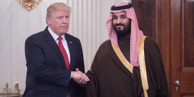 US President Donald Trump and Saudi Deputy Crown Prince and Defense Minister Mohammed bin Salman shake hands in the State Dining Room before lunch at the White House in Washington, DC, on March 14, 2017.Trump welcomed the prince to the Oval Office, as both countries expect to improve ties that were frequently strained under Barack Obama's administration. Saudi Arabia is likely to welcome Trump's harder line on its arch-rival Iran and there is likely to be less friction over Riyadh's war against