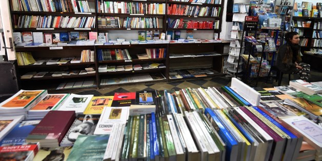 Books are exposed on shelves at the Ijtihed bookshop in the Algerian capital Algiers on February 16, 2015. AFP PHOTO / FAROUK BATICHE (Photo credit should read FAROUK BATICHE/AFP/Getty Images)