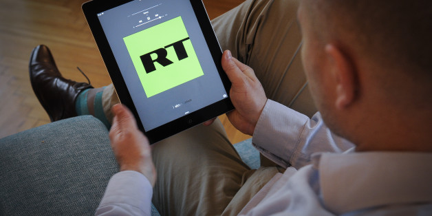 The Russia Today application is seen on an iPad on November 10, 2017. The Russian news outlet has said it will cooperate with the demands of the Department of Justice and register their Amreican subsidiary as a foreign agent after intelligence agencies concluded it was responsible for facilitating fake-news to influence election campaigns. (Photo by Jaap Arriens/NurPhoto via Getty Images)