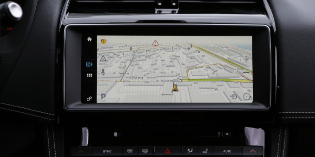 The display screen of a connected Yandex.Auto in-car service system showing the company's real time maps and traffic navigator sits on the dashboard of a Jaguar F-Pace automobile during a preview event at the headquarters of Yandex NV in Moscow, Russia, on Tuesday, Sept. 19, 2017. Yandex NV, the maker of Russias most-popular internet search engine, has created a set of services for some connected Toyota Motor Corp. and Tata Motors Ltd vehicles sold in the country as it seeks to expand b