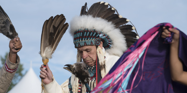 Capilano Reserve, West Vancouver, British Columbia, Canada 'u2014 8 July 2017. The Squamish Nation 30th Annual Powwow, gathering of First Nations communities to honour their culture, share, respect, dance,drum. This is an example of exquisite regalia.
