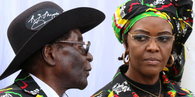 President Robert Mugabe and his wife Grace attend a rally of his ruling ZANU (PF) in Chinhoyi, Zimbabwe, July 29, 2017. REUTERS/Philimon Bulawayo