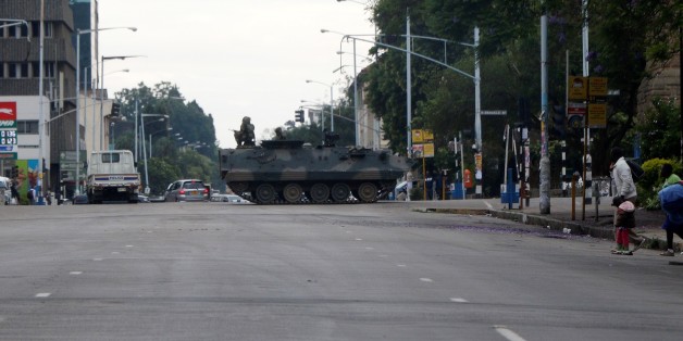 HARARE, ZIMBABWE - NOVEMBER 15 : A tank seals off a main road to the Zimbabwe high court within the military activities taking place in Harare, Zimbabwe on November 15, 2017. President Robert Mugabe and his family have been detained following military intervention in capital Harare, which an army spokesman and the ruling party insisted Wednesday was not a coup. Military officers appeared on television early Wednesday to make a statement saying they were targeting criminals around President Robert Mugabe.
(Photo by Stringer/Anadolu Agency/Getty Images)