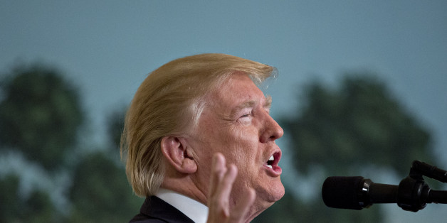 U.S. President Donald Trump speaks while delivering remarks on his recent 11-day Asia trip in the Diplomatic Room of the White House in Washington, D.C., U.S., on Wednesday, Nov. 15, 2017. Trump said Chinese President Xi Jinping recognizes that a nuclear North Korea is a grave threat to China, and we agreed we would not accept a freeze-for-freeze agreement. Photographer: Andrew Harrer/Bloomberg via Getty Images