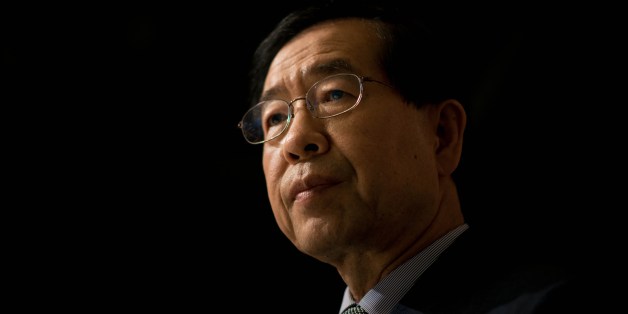 To go with AFP story Skorea-vote-mayor,FOCUS by Giles HewittIn a photo taken on May 26, 2014 Seoul mayoral candidate Park Won-Soon attends an interview with AFP in Seoul. The former civil rights activist made history by winning the 2011 mayoral election as an independent -- although he has since joined the main opposition grouping -- and believes South Korea is in a historical period of transition, with people seeking to move away from a hyper-competitive society to one more focused on quality o