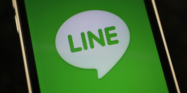 The logo of free messaging app Line is pictured on a smartphone in this photo illustration taken in Tokyo September 23, 2014. Naver Corp held off on an IPO for its Line Corp unit on the belief that the messaging app operator can command a better valuation by further building its revenue and profit, Naver's chief financial officer told Reuters on Tuesday. South Korea-based Naver said on Monday that it does not plan an initial public offering for Line this year, dashing market expectations for a d