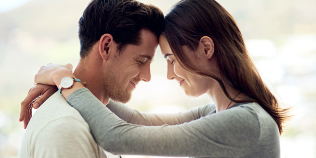 Shot of a young couple sharing a tender moment