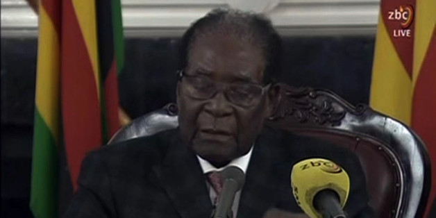 A video grab made on November 19, 2017 from footage of the broadcast of Zimbabwe Broadcasting corporation (ZBC) shows Zimbabwe's President Robert Mugabe delivering a speech in Harare, following a meeting with army chiefs who have seized power in Zimbabwe.Zimbabwean President Robert Mugabe, in a much-expected TV address, stressed he was still in power after his authoritarian 37-year reign was rocked by a military takeover. Many Zimbabweans expected Mugabe to resign after the army seized power las
