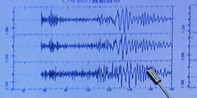 Japan Meteorological Agency's earthquake and tsunami observations division director Toshiyuki Matsumori points at graphs of ground motion waveform data observed in Japan during a news conference at the Japan Meteorological Agency in Tokyo, Japan, September 3, 2017, following the earthquake felt in North Korea and believed to be a nuclear test. REUTERS/Toru Hanai