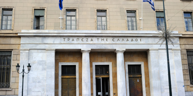 Athens, Greece - November 4, 2011: Entrance and part of the BANK OF GREECE building in Athens. It is the central bank of the country. Was established in 1927