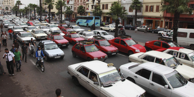 Taxi drivers protesting against a fuel hike bring traffic to a standstill outside the police headquarters in Casablanca's city centre June 11, 2012. Taxi drivers protested on Monday against a hike in fuel prices implemented by Moroccan Prime Minister Abdelilah Benkirane's government. REUTERS/Macao (MOROCCO - Tags: TRANSPORT BUSINESS POLITICS ENERGY)
