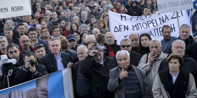 LESBOS ISLAND, GREECE - NOVEMBER 20: Workers and other civilians stage a protest, organized to show their reaction to European Union and to the government on increase in the population of refugees in the island in Lesbos Island, Greece on November 20, 2017. (Photo by Ayhan Mehmet/Anadolu Agency/Getty Images)