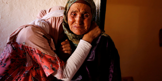 Relatives mourn the death of Lakbira Essabiry, one of the people who were killed when a stampede broke out in the southwestern Moroccan town of Sidi Boulaalam as food aid was being distributed in a market, in Sidi Boullaalam, Morocco November 20, 2017. REUTERS/Youssef Boudlal