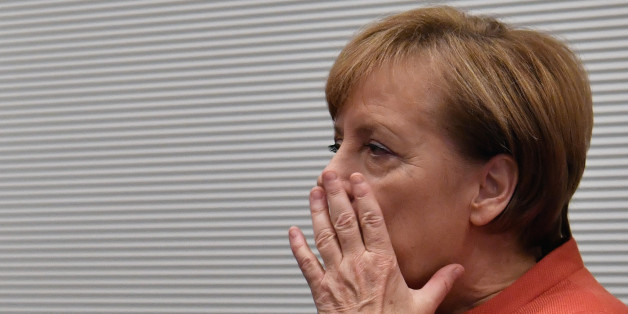 German Chancellor Angela Merkel arrives prior to a parliamentary group meeting of the conservative CDU/CSU faction on November 20, 2017 in Berlin. Following more than a month of gruelling negotiations, the leader of the pro-business FDP, Christian Lindner, walked out of talks overnight, on November 19, 2017 saying there was no 'basis of trust' to forge a government with Merkel's conservative alliance CDU-CSU and the ecologist Greens. / AFP PHOTO / John MACDOUGALL / ALTERNATIVE CROP (Phot