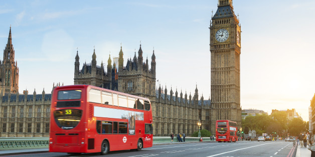 London, United Kingdom - August 20, 2016: Westminster palace and Big Ben and traffic on Westminster bridge in foreground