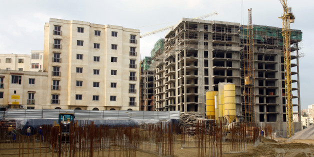 ALGIERS, ALGERIA - DECEMBER 6: Life in the Algerian capital, a construction site for housing in the Kouba district on December 6, 2007 in Algiers, Algeria. (Photo by Pascal Parrot/Getty Images)