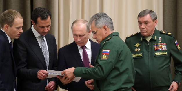 SOCHI, RUSSIA - NOVEMBER 21, 2017: Syria's President Bashar al-Assad (2nd L), Russia's President Vladimir Putin (C back), Russia's Defence Minister Sergei Shoigu (C front), and his first deputy, Chief of the General Staff of the Russian Armed Forces Valery Gerasimov (R) during a meeting at Bocharov Ruchei residence. Mikhail Klimentyev/Russian Presidential Press and Information Office/TASS (Photo by Mikhail Klimentyev\TASS via Getty Images)