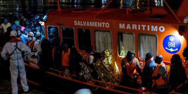 At the harbour of Malaga, South of Spain, a Spanish rescued boat, with migrants onboard. On 11 November 2017 in Malaga, Spain. On saturday night, the Port authority from Malaga, with the help of the Red Cross, provide a first help to more than 160 migrants, who had just been rescued in the Mediterranean sea by three vessels from the Spanish Maritine. This is one oh the highest record of arrival in the city of Malaga. All the migrants were in good condition, only a few of them were brought to the hospital. (Photo by Guillaume Pinon/NurPhoto via Getty Images)