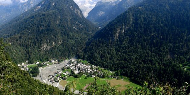 A general view shows the Swiss village of Bondo after another landslide on August 25, 2017.
Eight hikers are still missing after a massive landslide swept away an entire mountainside in the Swiss Alps, ripping apart buildings and forcing the evacuation of a village. The landslide, which struck on August 22, sent mud, rocks and dirt flooding down the Piz Cengalo mountain into the outskirts of the village of Bondo, near the Italian border. / AFP PHOTO / MIGUEL MEDINA (Photo credit should read MIGUEL MEDINA/AFP/Getty Images)