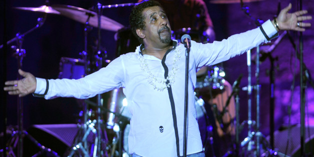 Algerian singer Cheb Khaled performs during the 49th session of International Festival of Carthage on July 21, 2013 at the Roman theatre of Carthage . AFP PHOTO / FETHI BELAID (Photo credit should read FETHI BELAID/AFP/Getty Images)