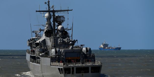 Argentina's Navy destroyer ARA Sarandi sails off to take part in the search of missing submarine ARA San Juan, from the north breakwater of Argentina's Navy base in Mar del Plata, on the Atlantic coast south of Buenos Aires, on November 21, 2017.
An international search mission for a missing Argentine submarine entered its sixth day Tuesday as uncertainty over the fate of its 44 crew members gave way to rising anguish for families troubled by earlier false hopes. / AFP PHOTO / EITAN ABRAMOVICH (Photo credit should read EITAN ABRAMOVICH/AFP/Getty Images)