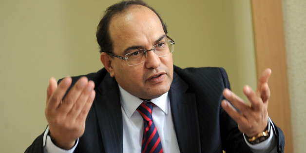 Lawyer and human rights defender Chawki Tabib, one of the contestants for the position of Tunisian Prime Minister, is seen in his office on December 4, 2013 in Tunis. Tabib, who turns 50 at the end of December, had been repeatedly proposed for the premiership by the Popular Front, a leftist grouping of opposition parties, during crisis talks with the ruling Islamists aimed at breaking months of political deadlock. AFP PHOTO / FETHI BELAID (Photo credit should read FETHI BELAID/AFP/Getty I