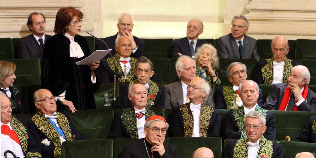 Assia Djebar (standing) delivers her acceptance speech at the Academie Francaise in Paris June 22, 2006. Djebar, who has written extensively about the life of Muslim women, is the first Algerian woman to enter the official guardian of the French language, the Academie Francaise, founded in 1635. REUTERS/Philippe Wojazer (FRANCE)