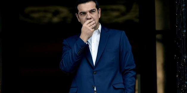 Greek Prime Minister Alexis Tsipras reacts as he waits for the his South Korean counterpart at his office in Athens on October 23, 2017. Greece has slightly revised downwards, to 3.7% from the previously estimated 3.9%, its primary budget surplus in 2016, a result that remains the requirements of its creditors, the EU and the IMF. This announcement, by the Greek statistical agency Elstat, coincides with the return to Athens of its bailout negotiators, for a new round of inspection of the implem