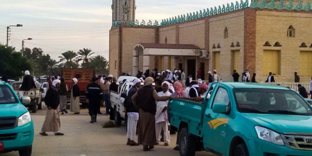 AL ARISH, EGYPT - NOVEMBER 24: People gather at the site of the Egypt Sinai mosque bombing in Al-Arish, Egypt on November 24, 2017. The death toll from a bomb that went off outside a mosque in the city of Al-Arish in the northern Sinai Peninsula following Friday prayers has climbed to a whopping 235, according to official sources. At least 109 others were injured in the blast, which occurred in the citys Al-Rawda neighborhood.
(Photo by Stringer/Anadolu Agency/Getty Images)
