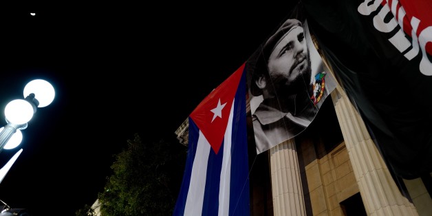 A giant poster of late former president Fidel Castro hangs on a building at the University of Havana to commemorate the first anniversary of his death, on November 25, 2017.On November 25 Cuba commemorates the first anniversary of the death of Fidel Castro, during an electoral process that will bring a change in president against a backdrop of economic recession, hostility from the United States, and stagnation in the reforms that have been implemented. / AFP PHOTO / ADALBERTO ROQUE (Phot
