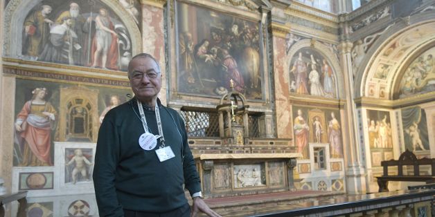 Syrian born Mohamed Hamadi poses in the church of San Maurizio al Monastero Maggiore, on November 15, 2017 in central Milan. Mohamed Hamadi who is retired is part of volunteers that guide visitors in this catholic church. / AFP PHOTO / Miguel MEDINA (Photo credit should read MIGUEL MEDINA/AFP/Getty Images)