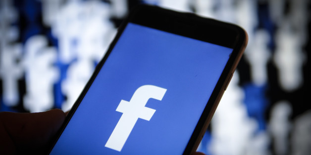 A Facebook logo is seen on an iPhone screen in this photo illustration on November 20, 2017. (Photo by Jaap Arriens/NurPhoto via Getty Images)
