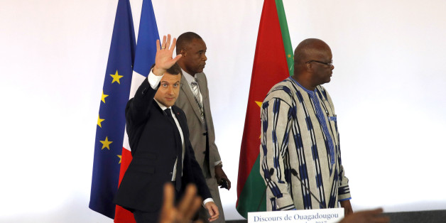 French President Emmanuel Macron waves as he arrives to deliver a speech at the Ouagadougou University, in Ouagadougou, Burkina Faso, on November 28, 2017, as part of his first African tour since taking office. / AFP PHOTO / POOL / PHILIPPE WOJAZER (Photo credit should read PHILIPPE WOJAZER/AFP/Getty Images)