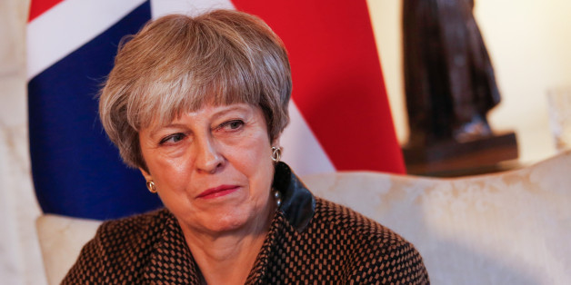 Theresa May, U.K. prime minister, pauses during her bilateral meeting with Binali Yildirim, Turkey's prime minister, inside number 10 Downing Street in London, U.K., on Monday, Nov. 27, 2017. May has a week to find a compromise on the conflicting Brexit demands from the north and south of Ireland, just as a political scandal threatening the Irish government could further undermine her chances of success. Photographer: Luke MacGregor/Bloomberg via Getty Images