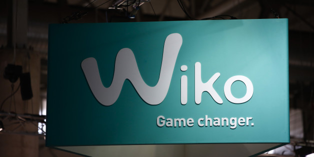 A Wiko logo sits on display in the Wiko pavilion at the Mobile World Congress in Barcelona, Spain, on Tuesday, March 3, 2015. The event, which generates several hundred million euros in revenue for the city of Barcelona each year, also means the world for a week turns its attention back to Europe for the latest in technology, despite a lagging ecosystem. Photographer: Simon Dawson/Bloomberg via Getty Images