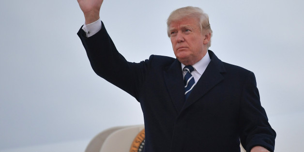 US President Donald Trump steps off Air Force One upon arrival at Andrews Air Force Base in Maryland on December 2, 2017. Trump is returning to Washington, DC after attending fundraisers in New York, New York. / AFP PHOTO / MANDEL NGAN (Photo credit should read MANDEL NGAN/AFP/Getty Images)