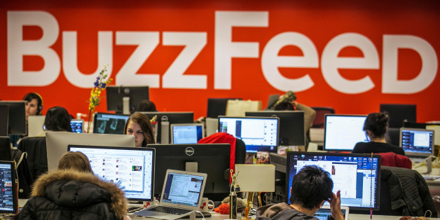 Buzzfeed employees work at the company's headquarters in New York January 9, 2014. REUTERS/Brendan McDermid/File Photo
