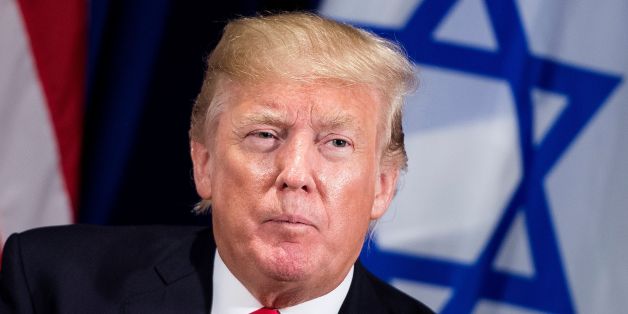 US President Donald Trump pauses while making a statement for the press before a meeting with Israel's Prime Minister Benjamin Netanyahu at the Palace Hotel during the 72nd session of the United Nations General Assembly on September 18, 2017, in New York. / AFP PHOTO / Brendan Smialowski (Photo credit should read BRENDAN SMIALOWSKI/AFP/Getty Images)