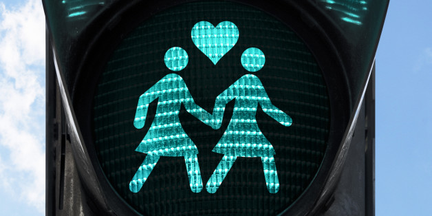 traffic light with gay theme - two women holding hands.