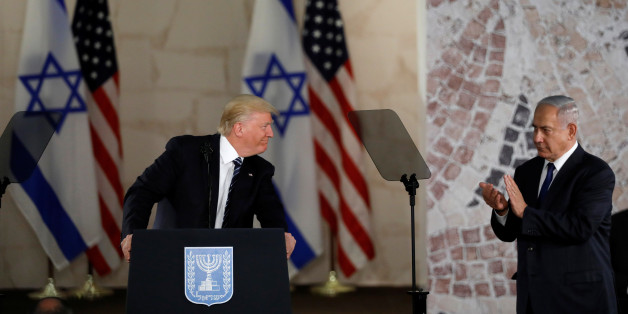 U.S. President Donald Trump (L), talks on a podium near Israeli Prime Minister Benjamin Netanyahu at the Israel Museum in Jerusalem May 23, 2017. REUTERS/Ronen Zvulun