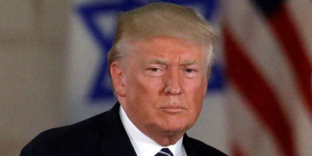 U.S. President Donald Trump, near an Israeli flag at the Israel Museum in Jerusalem May 23, 2017. REUTERS/Ronen Zvulun