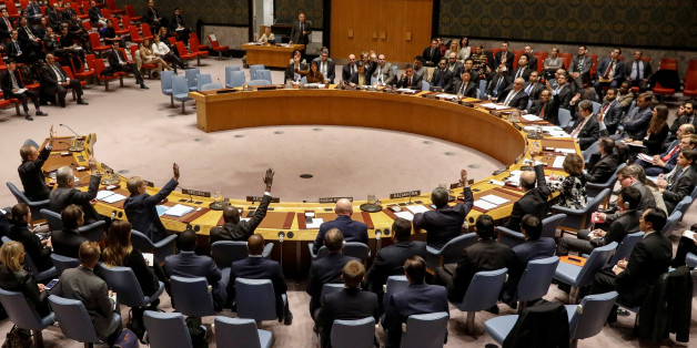 The United Nations Security Council votes to renew an international inquiry into chemical weapons attacks in Syria, during a meeting at the United Nations headquarters in New York, U.S., November 17, 2017. REUTERS/Brendan McDermid