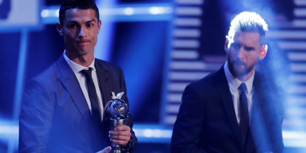 Soccer Football - The Best FIFA Football Awards - London Palladium, London, Britain - October 23, 2017 Real Madridâs Cristiano Ronaldo and Barcelonaâs Lionel Messi after being selected in the FIFA FIFPro World 11 during the awards REUTERS/Eddie Keogh