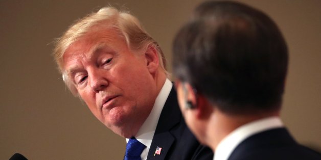 SEOUL, SOUTH KOREA - NOVEMBER 07: U.S. President Donald Trump (L) talks with South Korean President Moon Jae-In (R) during the joint press conference at the presidential Blue House on November 7, 2017 in Seoul, South Korea. Trump is in South Korea as a part of his Asian tour. (Photo by Chung Sung-Jun/Getty Images)