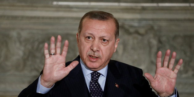 Greek Prime Minister Alexis Tsipras (not pictured) and Turkish President Tayyip Erdogan attend a press conference following their meeting at the Maximos Mansion in Athens, Greece December 7, 2017. REUTERS/Costas Baltas
